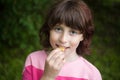 Girl eating chips Royalty Free Stock Photo