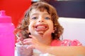 Girl eating chocolate ice cream dirty face Royalty Free Stock Photo