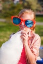 Girl eating cotton candy Royalty Free Stock Photo