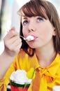 Girl eating a dessert