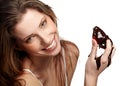 Girl eating a fresh red strawberry Royalty Free Stock Photo