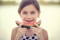 Girl eating fresh watermelon.Summer joy sweet red watermelon