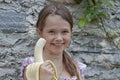 Girl is eating fruits