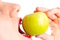 Girl eating green apple close up 3 Royalty Free Stock Photo