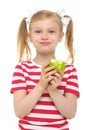 Girl eating green apple and smiling Royalty Free Stock Photo