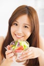 Girl eating healthy food salad Royalty Free Stock Photo