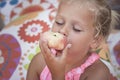 Girl eating a healthy fruit snack Royalty Free Stock Photo