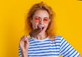 girl eating icelolly ice cream on background. photo of girl with icelolly ice cream at summer.