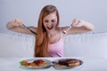 Girl eating a lot of food at once