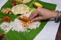 Girl eating Onam Sadhya with hand form Kerala India Royalty Free Stock Photo