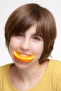 Girl Eating Orange Slice