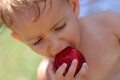 Girl eating peach