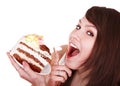 Girl eating piece of cake. Royalty Free Stock Photo