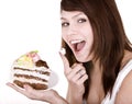 Girl eating piece of cake. Royalty Free Stock Photo