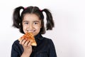 Girl eating pizza slice Royalty Free Stock Photo