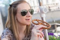 Girl Eating Pretzel Royalty Free Stock Photo