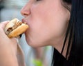 Girl Eating a Sandwich - Close up