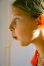 Girl eating Spaghetti