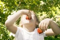 Girl eating strawberries. Royalty Free Stock Photo