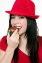 Girl eating strawberries Royalty Free Stock Photo