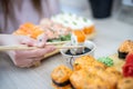 Girl eating sushi set with chopsticks on restaurant Royalty Free Stock Photo