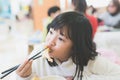 Girl eating Tempura Rice Bowl Royalty Free Stock Photo