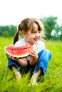 Girl eating water-melon Royalty Free Stock Photo