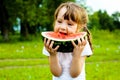 Girl eating water-melon Royalty Free Stock Photo