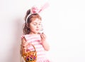 Girl eats a chocolate eggs Royalty Free Stock Photo