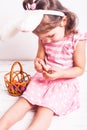 Girl eats a chocolate eggs Royalty Free Stock Photo
