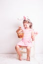 Girl eats a chocolate eggs Royalty Free Stock Photo