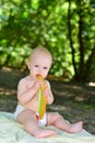 The girl eats a melon on a picnic Royalty Free Stock Photo