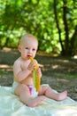 The girl eats a melon on a picnic Royalty Free Stock Photo