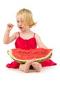 Girl eats melon teaspoon Royalty Free Stock Photo