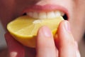 Girl Eats Sour Lemon Royalty Free Stock Photo