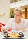 Girl eats sushi Royalty Free Stock Photo