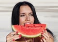 Girl eats a water-melon Royalty Free Stock Photo