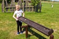 Girl and educational toy outdoors Royalty Free Stock Photo