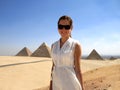 Girl and the Egyptian piramids Royalty Free Stock Photo