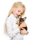 The girl embraces a puppy. Royalty Free Stock Photo