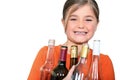 Girl with empty bottles