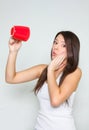 Girl with empty tea cup Royalty Free Stock Photo