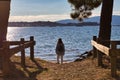 Girl at the end of a hiking path staring at the sea in Arousa Island Royalty Free Stock Photo