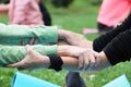 The girl is engaged in nature yoga. Pair yoga or acro yoga