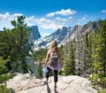 Hiker girl looking at beautiful mountain scenery in Colorado. Royalty Free Stock Photo