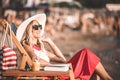 Girl enjoying a beautiful sunny day on the beach Royalty Free Stock Photo