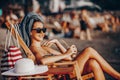 Girl enjoying a beautiful sunny day on the beach Royalty Free Stock Photo