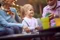 Girl  enjoying with her grandfather outdoor at home Royalty Free Stock Photo