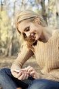 Girl enjoying internet wireless on smartphone in n Royalty Free Stock Photo