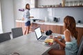 Girl   enjoying in  morning coffee while working on laptop Royalty Free Stock Photo